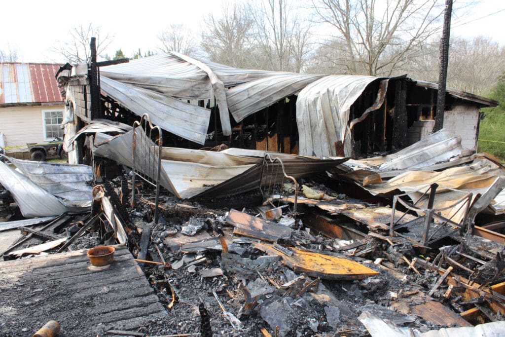 The remnants of a fatal home explosion above the Oak Grove mine in March 2024. Credit: Courtesy of the Alabama Fire Marshal's Office