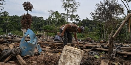 Farmer Jose Pena looks for belongings amid rubble after a bomb dropped by the Ecuadorian army in the Lago Agrio region, Sucumbios province, Ecuador, on the border with Colombia, on March 18, 2026.