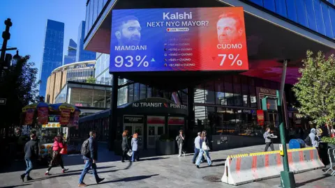 Bloomberg via Getty Images A Kalshi billboard displaying New York City mayoral election odds in New York, US, on Monday, Oct. 27, 2025